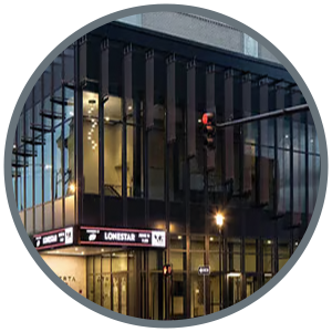 Image of exterior building representing a national account program for multi-location standardization of lighting design, specification, and procurement decisions.