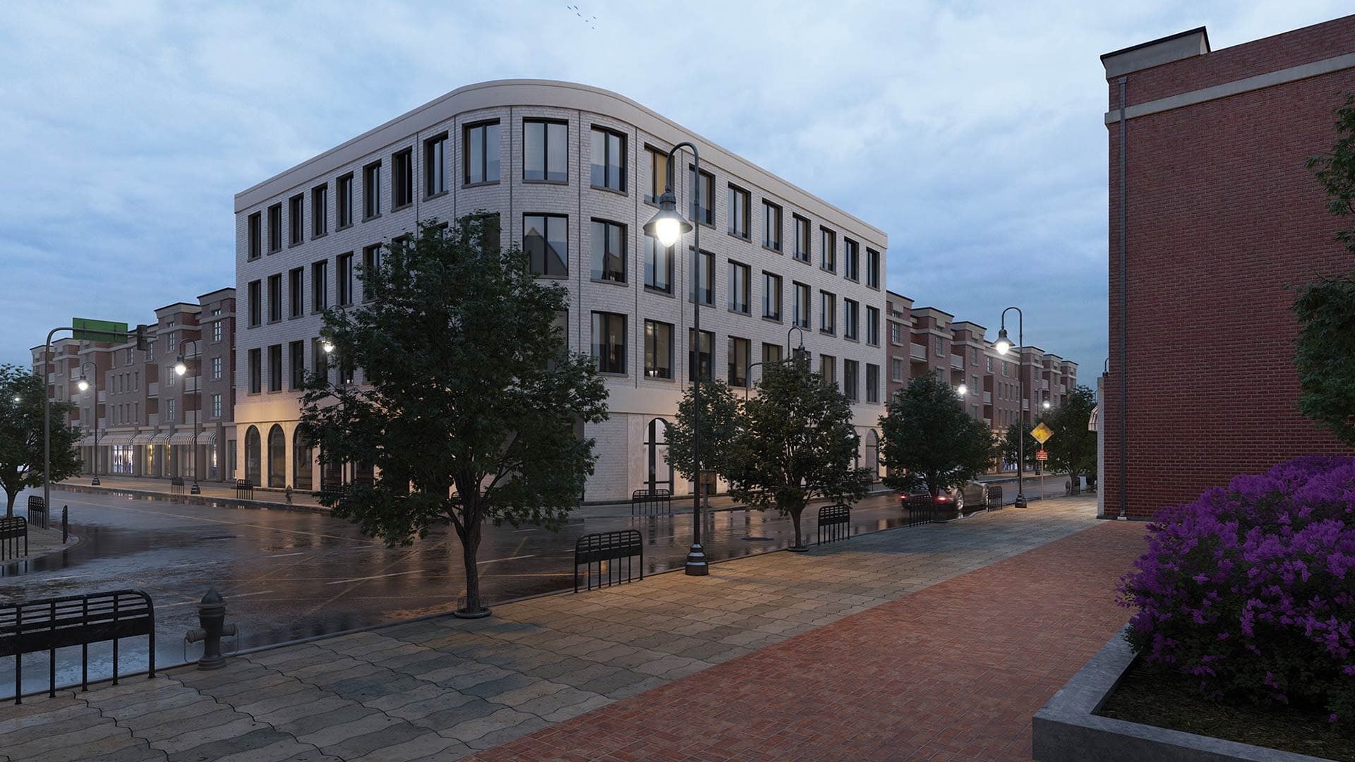 GlasWerks® LED Hallbrook® Extended Prismatic Pendant Series shown lighting a roadway.