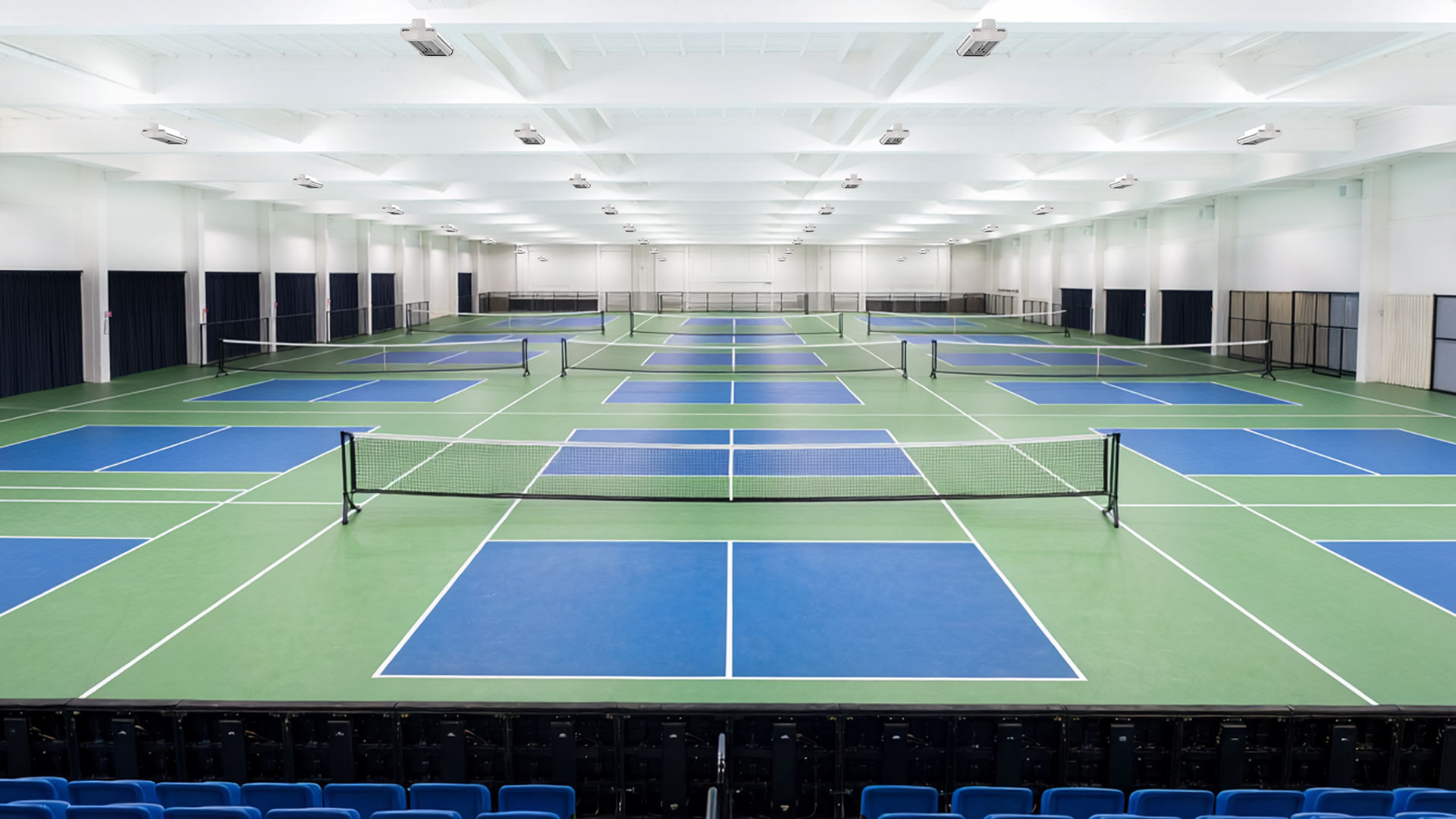 Beyond Linear LED High Bays from Lithonia illuminate indoor pickleball court 