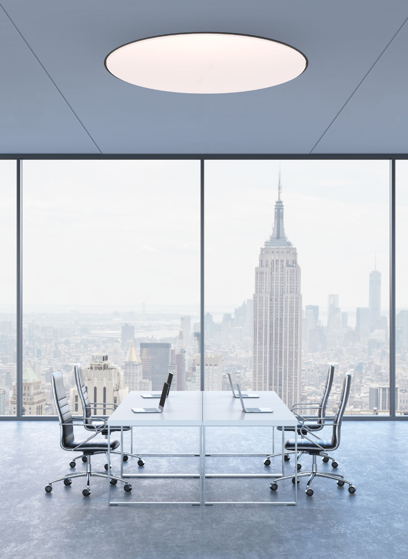 Direct ceiling recessed luminaire in corporate board room.